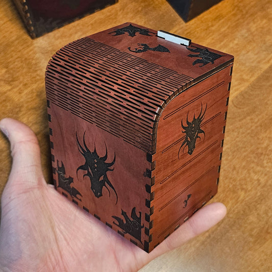 Brown laser cut card deck box with dragon motifs and waffle flex technology to allow the box to open.